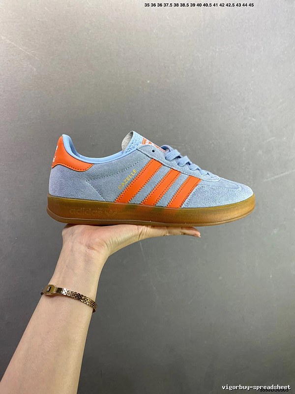 Adidas Light Blue and Orange Low-Profile Sneakers Highlighting Rounded Toe