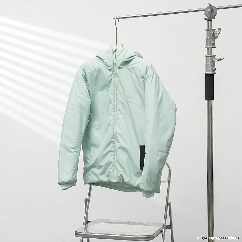 Clean Hooded Profile And Minimal Chest Branding Arc'teryx Lightweight Shell Jacket in Mint Green
